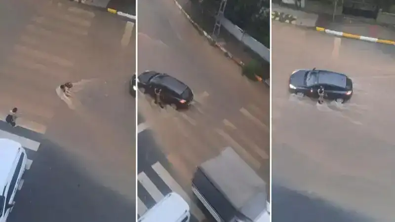 Sultanbeyli’de yağmur suyunda sürüklenerek yere düşen çocuğa sürücü yardım etti
